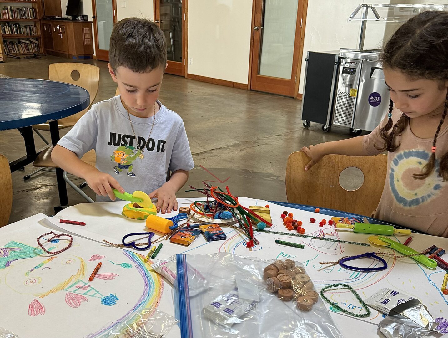 Two kids playing with toys